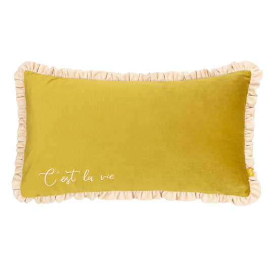 Yellow pillow with beige ruffle trim and 'C'est la vie' text on a white background