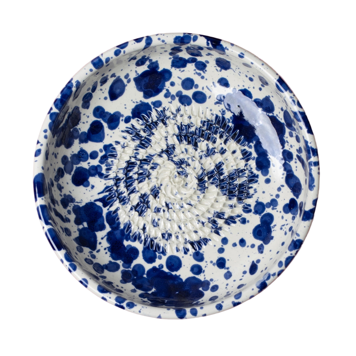 Ceramic bowl with blue speckled pattern